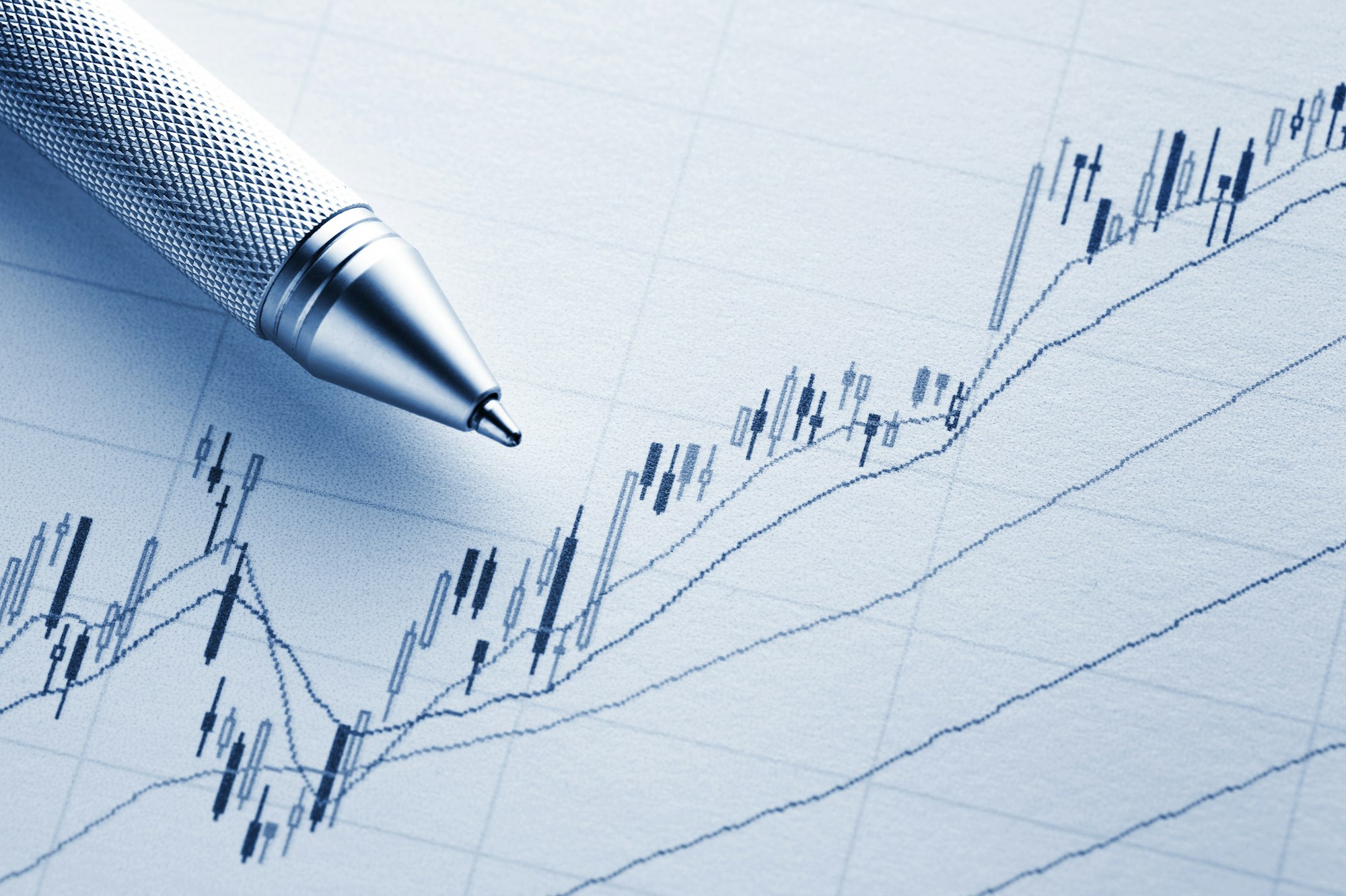 Increasing stock market graph with pen